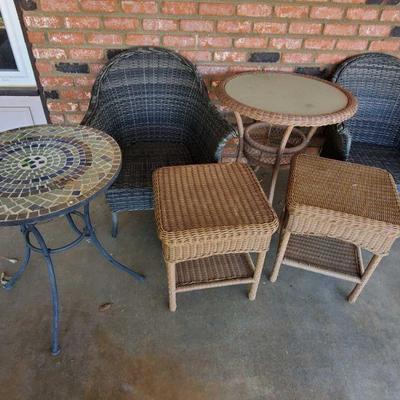 5021: bWicker Patio Furniture and Patio Table
Includes two end tables, two chairs and two Tables Tables measure approx 30