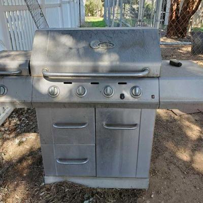 10009: Char-Broil Red Grill
Measures approx 23"x61"x46"

