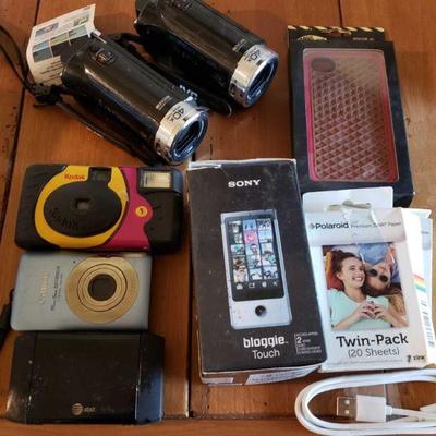 7022: 2 JVC Video Cameras, Sony Bloggie Touch, Cameras and More
Also includes cannon digital camera, Kodak powerflash camera,...