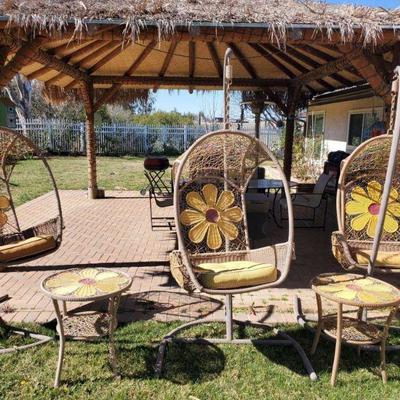 10006: 3 Wicker Hammock Chairs with 2 End Tables
Chairs measure 40" x 80" with stand Tables measures 22" x 24"