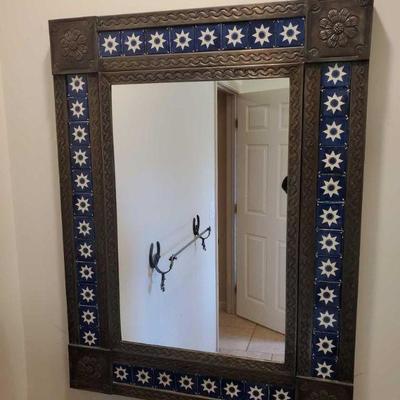 6004: Spanish Mirror made out of tin and Hand Painted Tiles
Measures 32" tall and 25" wide