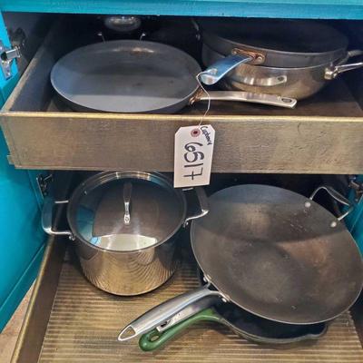 Kitchen Cookware
Includes castiron pan, pots, pans and a wok