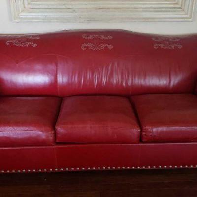 7000: Red Leather Couch and Arm Chair with Ottoman
Couch measures approx 95" x 40" x 35" Arm chair measures approx...
