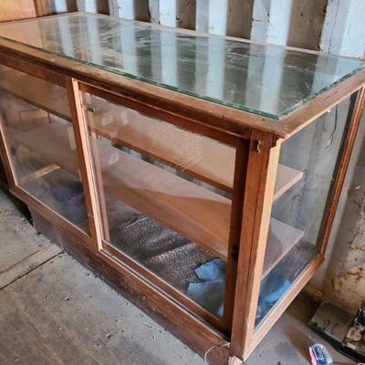 4204: Wood and Glass Display Cabinet
Measures approximately 42" x 62" x 26"