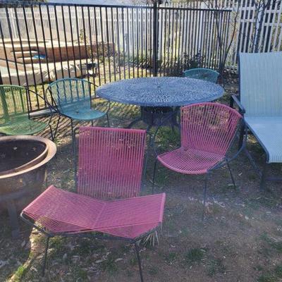 10015: Patio Table, Chairs, Lounge Chair and Fire Pit
Table measures approx 55" x 29" Chairs measure approx 29" x 25"...