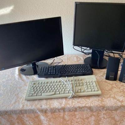Two Monitors and Keyboards