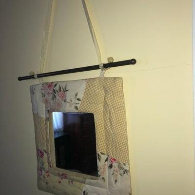 Small mirror framed in cloth