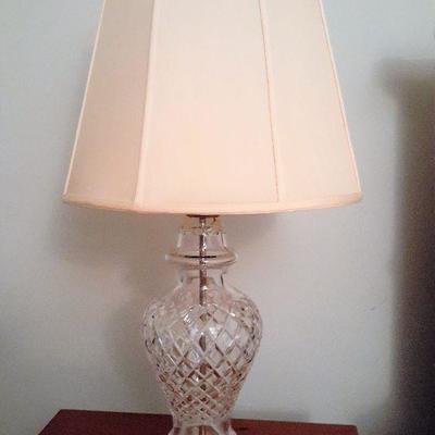 One of pair of crystal glass lamps with shades