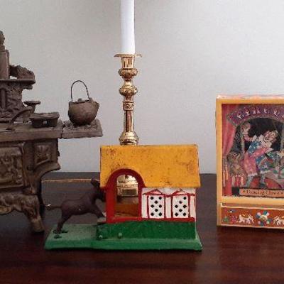 Display of vintage cast iron items, and dancing shadowboxes