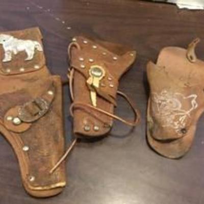 3 vintage leather holsters