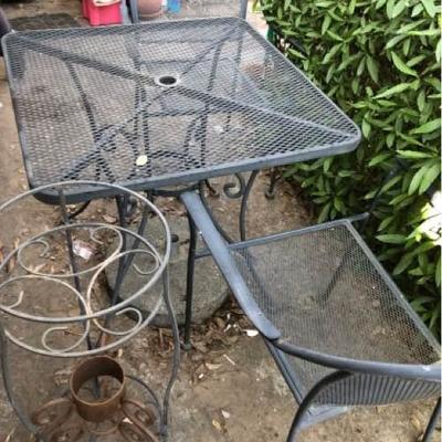 Black Wrought Iron Table and Two Chairs