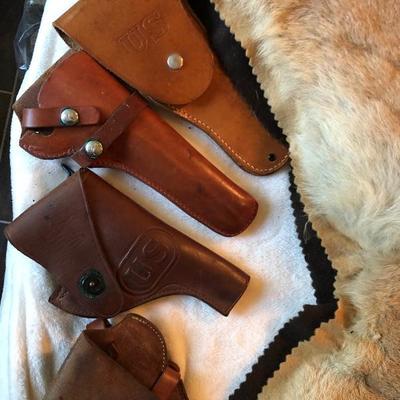 Holsters
Guns
Leather
Firearms
