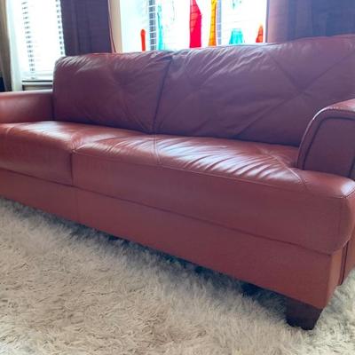 Add some instant character to any room with this leather sofa ( burnt orange).