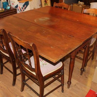 ANTIQUE TABLE AND FOUR CHAIRS