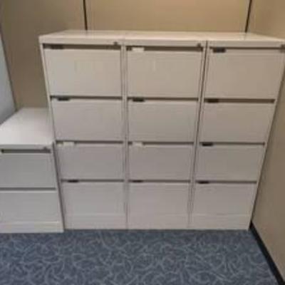 Four Metal Filing Cabinets