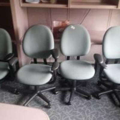 Four Rolling Office Chairs