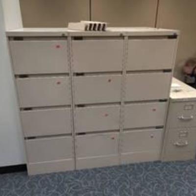 Four Metal Filing Cabinets,