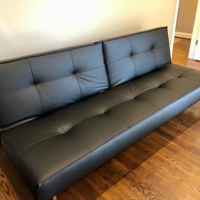 Innovation Leather Futon ( Turns into Bed). $650.
