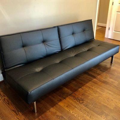 Innovation Leather Futon ( Turns into Bed). $650.
