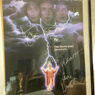 All cast members signed poster