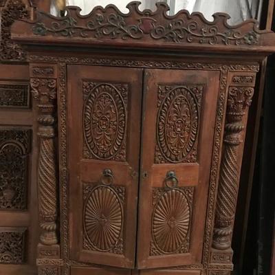 Hand carved cabinet $2,500