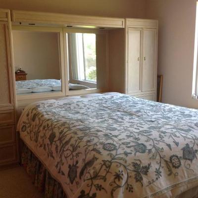 Queen bed and lots of bedding