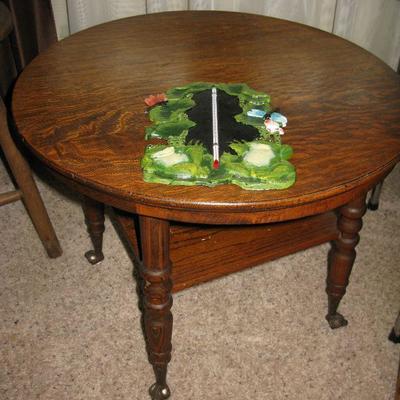 Antique small round oak table with glass ball claw feet   
BUY IT NOW $ 75.00