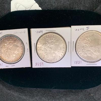3 Uncirculated Morgan Silver Dollars