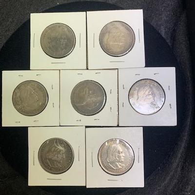 7 U.S. Columbian Silver Half Dollars