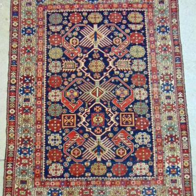 One of a collection of estate fresh Persian carpets