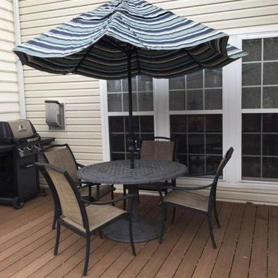 Round Patio Table, 4 Chairs, and Umbrella