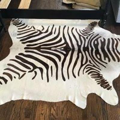 Cowhide zebra print area rug
72â€x 90â€
Full price $250.00; if interested call (314) 805-6219 