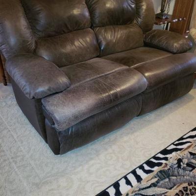 DOUBLE RECLINING ROCKER LOVESEAT WITH SOFT SUEDE LIKE UPHOLSTERY DOUBLE CONSOLE WITH CUPHOLDERS $450