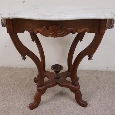 1049	WALNUT VICTORIAN MARBLE TOP TURTLE TOP TABLE 
