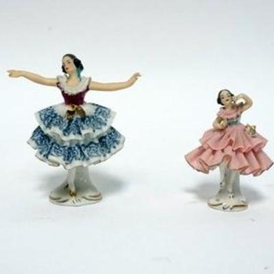 1014	4 DRESDEN BALLERINA FIGURES WITH LACE SKIRTS. TALLEST IS 4 IN. 
