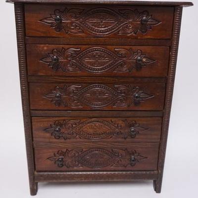 1060	PRESS DECORATED MINIATURE DESK, HAS FIVE DRAWERS, 17 IN W, 21 1/4 IN H 
