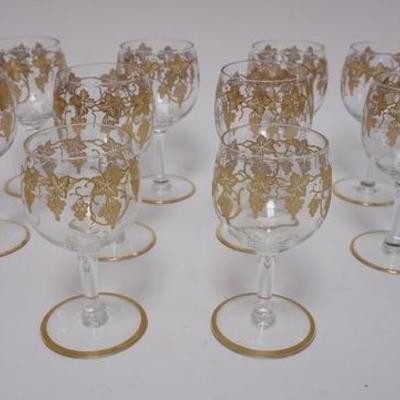 1033	GROUP OF 12 GOLD DECORATED GOBLETS W/ GRAPE VINE DESIGN, 10 ARE 5 3/4 IN H, 2 ARE 5 1/4 IN H
