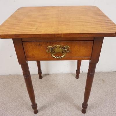 1005	ANTIQUE TIGER MAPLE AND CHERRY ONE DRAWER STAND WITH TURNED LEGS. 
