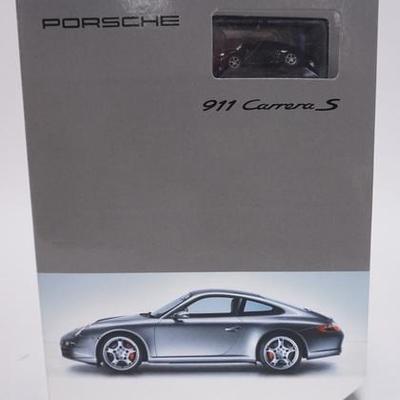 1084	PORSCHE 911 CARRERA S 1/64TH SCALE REMOTE CONTROLLED CAR 
