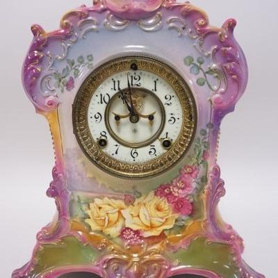 1011	ROYAL BONN CHINA CLOCK. LA FLORIDE GERMAN. 15 IN HIGH, 13 1/2 IN WIDE AND 6 IN DEEP.
