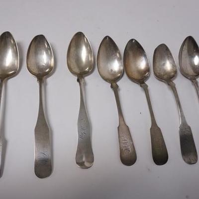 1035	GROUP OF SEVEN COIN SILVER SERVING SPOONS VARIOUS MAKERS, LONGEST IS 8 3/4 IN, ONE HAS A WORN BOWL TIP, 9.255 TROY OZ
