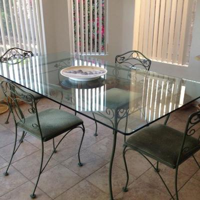 Glass top table and 4 chairs, $75