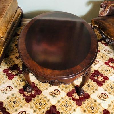 (No. 51) Ball and claw oval coffee table. Very well made and in great condition! (Mahogany)? $125