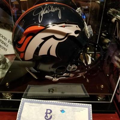 (No 124) Signed John Elway Helmet 1999 with COA.  Comes with display case 