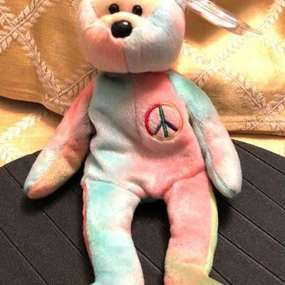 This PEACE Bear was introduced on May 11, 1997. PEACE was retired on July 14, 1999.

Ty.com