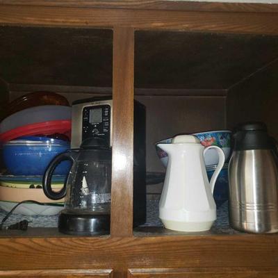 2 Cupboards Full of Kitchen Appliances and Vases
Items include coffee pot, baking bowls, thermos dispensers, punch bowls and more!
 	 