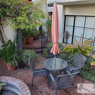 Patio Table with Umbrella and 4 Chairs table measures approx 32x27 chairs measure approx 21x21x34 umbrella measures approx 104"