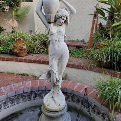Statue Fountain and Metal Tower measures approx 5'2. Metal Tower measures approx 24"