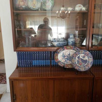 2 Wooden Hutches
**ITEMS ON HUTCH NOT INCLUDED Each measures approx 47" x 24" x 75" Hutches are screwed to wall