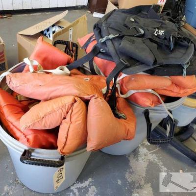  Approx 12 Life Jackets with Trashcans
